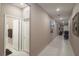 Long hallway with access to bedrooms and bath at 3556 Valley Lily St, North Las Vegas, NV 89032