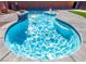 Sparkling blue pool with a relaxing water feature at 3556 Valley Lily St, North Las Vegas, NV 89032