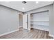 Large bedroom closet with built-in shelving at 3971 Foxboro Cir, Las Vegas, NV 89121