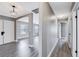 Inviting entryway with wood-look floors and neutral walls at 3971 Foxboro Cir, Las Vegas, NV 89121