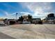Gated entrance to Forest Hills community with paved road and landscaping at 3971 Foxboro Cir, Las Vegas, NV 89121