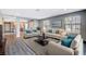 Living room with hardwood floors and stylish furniture at 3971 Foxboro Cir, Las Vegas, NV 89121