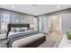 Main bedroom with hardwood floors and ensuite bathroom at 3971 Foxboro Cir, Las Vegas, NV 89121