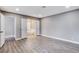 Main bedroom with hardwood floors and ensuite bathroom access at 3971 Foxboro Cir, Las Vegas, NV 89121