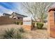 Granbury community sign with desert landscaping against homes and blue sky at 4372 Panoramic View Ave, North Las Vegas, NV 89084