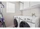 Bright laundry room with Samsung washer and dryer at 618 Lava Beds Way, North Las Vegas, NV 89084