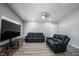 Living room with sectional sofa and TV at 6435 Placer Dr, Las Vegas, NV 89103