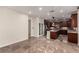 Modern kitchen with granite countertops, stainless steel appliances, and an island at 6440 Bright Morning St, North Las Vegas, NV 89084