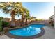 Inviting kidney-shaped pool with a stone coping at 6440 Bright Morning St, North Las Vegas, NV 89084