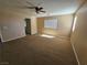 Bright bedroom with ceiling fan and carpet flooring at 6524 Heavenly Moon St, North Las Vegas, NV 89084