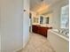 Double vanity bathroom with soaking tub and tile flooring at 7632 Highland Pony St, Las Vegas, NV 89149