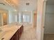 Bathroom boasts double sinks, a soaking tub, and separate shower at 7632 Highland Pony St, Las Vegas, NV 89149