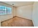 Bright bedroom with window and neutral walls at 7632 Highland Pony St, Las Vegas, NV 89149
