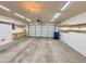 Garage with built-in shelving and ample space at 7632 Highland Pony St, Las Vegas, NV 89149