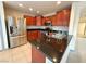 Spacious kitchen with stainless steel appliances and granite countertops at 7632 Highland Pony St, Las Vegas, NV 89149