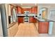 Modern kitchen featuring stainless steel appliances and wood cabinets at 7632 Highland Pony St, Las Vegas, NV 89149