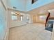 Spacious living room with high ceilings and tile floors at 7632 Highland Pony St, Las Vegas, NV 89149