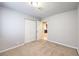 Bright bedroom with carpet flooring and double-door closet at 7779 Parnell Ave, Las Vegas, NV 89147