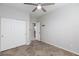 Spacious bedroom with herringbone floors, double doors and ceiling fan at 9085 Bridal Creek Ave, Las Vegas, NV 89178