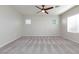 Bright bedroom with ceiling fan and carpet flooring at 9085 Bridal Creek Ave, Las Vegas, NV 89178