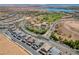 Aerial view of houses near lake and golf course at 92 Kimberlite Dr, Henderson, NV 89011