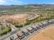 Aerial view of houses near lake and golf course at 92 Kimberlite Dr, Henderson, NV 89011