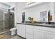 Elegant bathroom with dual sinks and a large shower at 92 Kimberlite Dr, Henderson, NV 89011