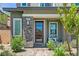 Inviting front entry with stone accents and landscaping at 92 Kimberlite Dr, Henderson, NV 89011