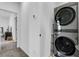 Convenient laundry room with stacked washer and dryer at 92 Kimberlite Dr, Henderson, NV 89011