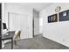 Home office with a desk, chair, and built-in closet at 92 Kimberlite Dr, Henderson, NV 89011