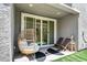Relaxing patio with wicker chairs and modern decor at 92 Kimberlite Dr, Henderson, NV 89011