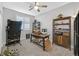 Bright home office features built-in shelving and plenty of space for a desk and other furnishings at 988 Buffalo River Ave, Henderson, NV 89002