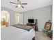 Main bedroom with ensuite bathroom access and a ceiling fan at 988 Buffalo River Ave, Henderson, NV 89002