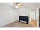 Bedroom with ceiling fan and double closet doors at 11015 Dornoch Castle St, Las Vegas, NV 89141