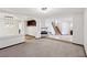 Living room with fireplace and view of staircase at 11015 Dornoch Castle St, Las Vegas, NV 89141