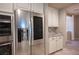 Stainless steel refrigerator with water dispenser in modern kitchen at 12461 Mosticone Way, Las Vegas, NV 89141