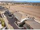 Luxury home with a three-car garage and desert landscape at 1319 Red Baron Ln, Boulder City, NV 89005