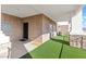Covered patio with artificial turf and a view at 1319 Red Baron Ln, Boulder City, NV 89005