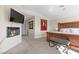 Spacious main bedroom with fireplace and large TV at 1319 Red Baron Ln, Boulder City, NV 89005