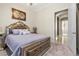 Spacious bedroom with plush bed and mirrored headboard at 1319 Red Baron Ln, Boulder City, NV 89005