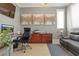 Home office with built-in cabinetry and comfortable seating at 1319 Red Baron Ln, Boulder City, NV 89005