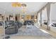 Elegant living room with a fireplace and large windows at 1319 Red Baron Ln, Boulder City, NV 89005