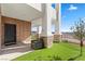 Covered patio with artificial turf and seating at 1319 Red Baron Ln, Boulder City, NV 89005