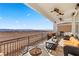 Spacious covered patio with stunning views and built-in fire pit at 1319 Red Baron Ln, Boulder City, NV 89005