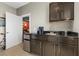 Convenient wet bar with sink, mini-fridge and coffee maker at 1319 Red Baron Ln, Boulder City, NV 89005