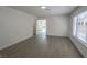 Bright and airy living room with wood-look floors and access to backyard at 1354 Bradhurst Ct, Las Vegas, NV 89142