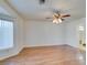 Spacious bedroom featuring hardwood floors and a ceiling fan at 1384 Glassy Pond Ave, Las Vegas, NV 89183