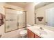 Bathroom with shower/tub, vanity, and linen storage at 1570 Raining Hills St, Henderson, NV 89052