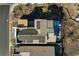 Aerial view of house with solar panels and pool; backyard features visible from above at 1968 Regal Bluff Dr, Henderson, NV 89052