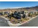 Aerial view of house on corner lot; showcasing landscaping and surrounding neighborhood at 1968 Regal Bluff Dr, Henderson, NV 89052